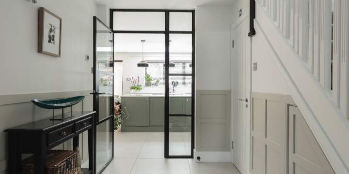 Full-width rear extension with large sliding doors in Englefield Green